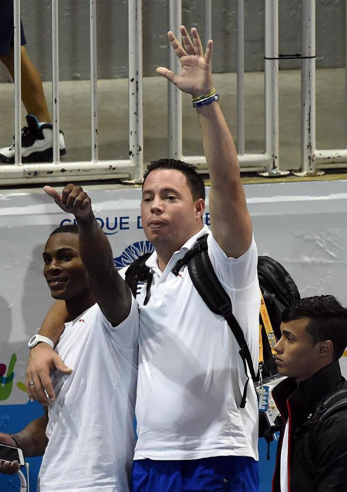 Manique Larduet and his coach Carlos Gil.