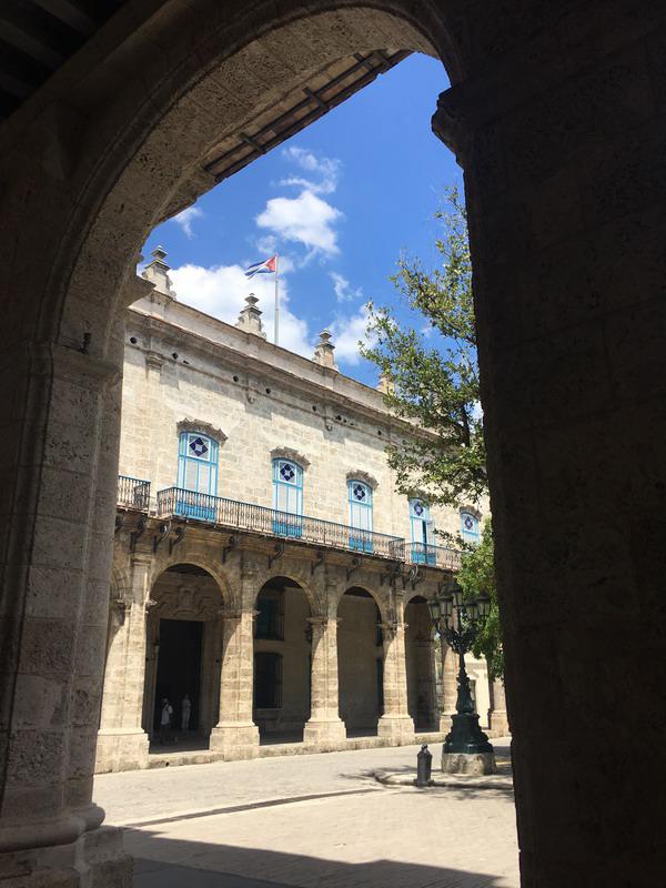 The majestic facade of countless arches of the Palacio de los Capitanes Generales.
