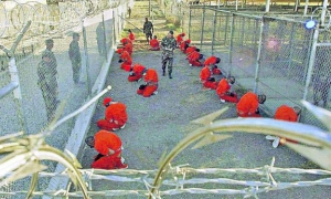 Pakistani detainees in the Guantanamo prison, in January of 2002, when some 600 prisoners were held. 