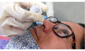 Cuban drug Nasalferon administered to travelers arriving in Cuba.